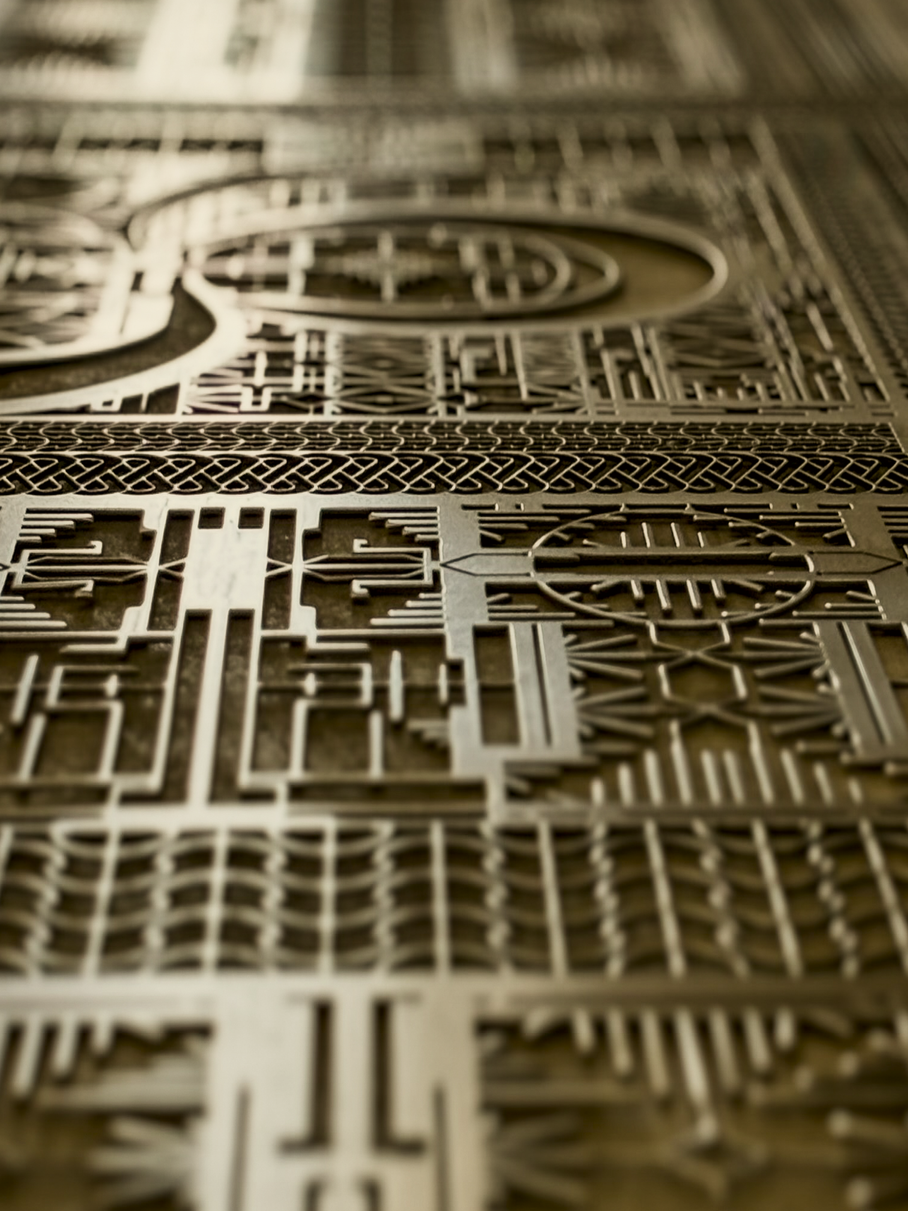 Infinity metal embroidery - raw metal finish close-up