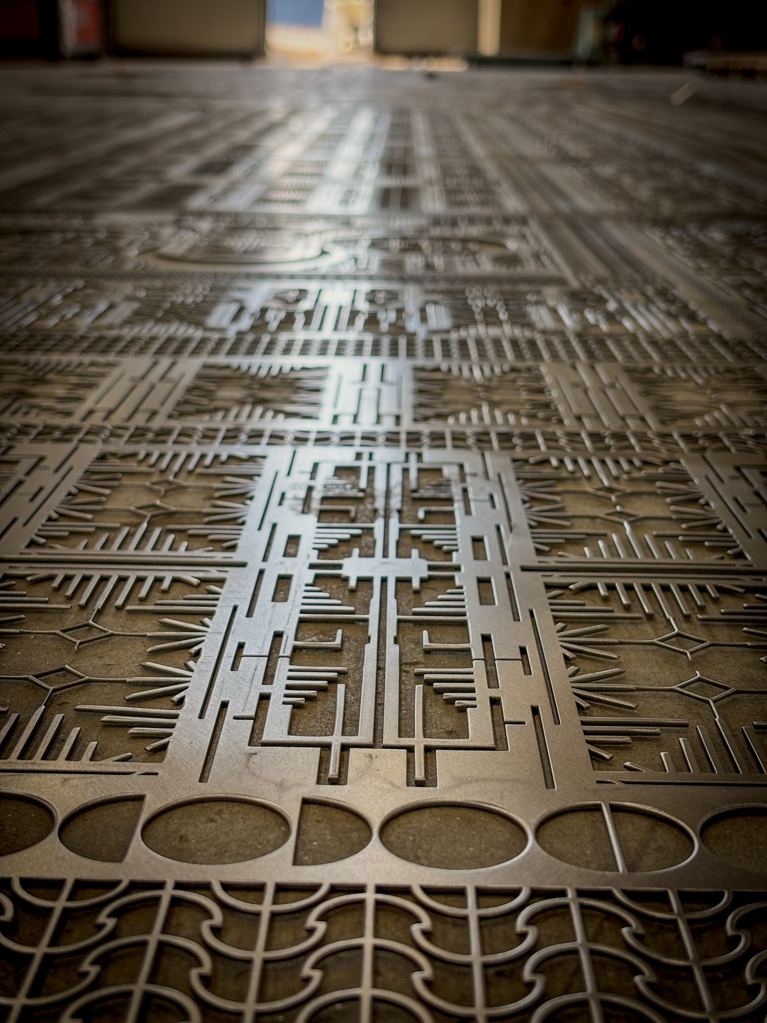 Infinity metal embroidery - raw metal finish close-upInfinity metal embroidery - raw metal finish close-up